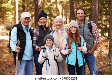 Multi Generation Family On Hike In Forest, Group Portrait