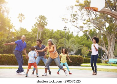 Multi Generation Family Playing Basketball Together - Powered by Shutterstock