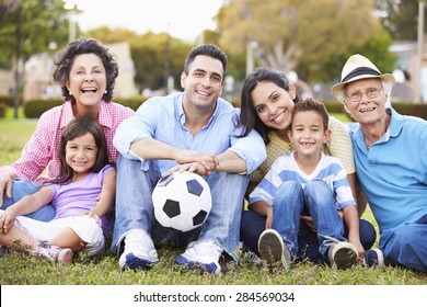 Multi Generation Family Playing Soccer Together - Powered by Shutterstock