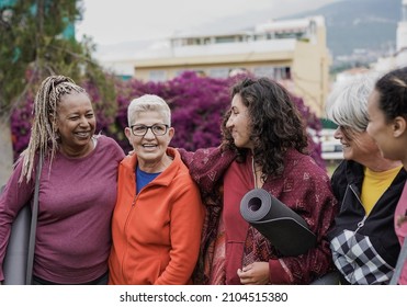 Multi Generational Women Embracing Together Outdoor After Yoga Class At City Park