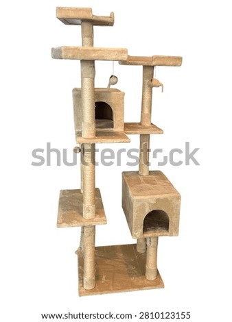 Multi level beige cat tree featuring two enclosed condos, sisal scratching posts, lounging perches, and hanging plush toys. Isolated on a white background, this indoor cat furniture provides climbing, scratching, resting, and play areas for cats and kittens. Ideal for pet care, home interiors, and feline lifestyle concepts.