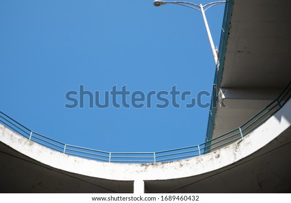 multi level car park\
with clear blue sky