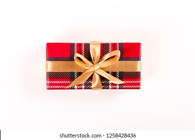 Multi purpose festive composition with present wrapped in colorful paper and tied with satin silk bow. Gift box for differet occasions. Close up, top view, copy space, background, flat lay.