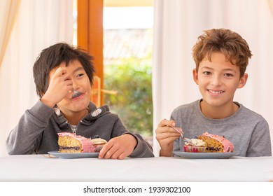 Multi Racial Family Children Eating Cake And Celebrating