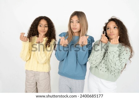 multi racial group of girl friends doing money gesture with hands, asking for salary payment, millionaire business