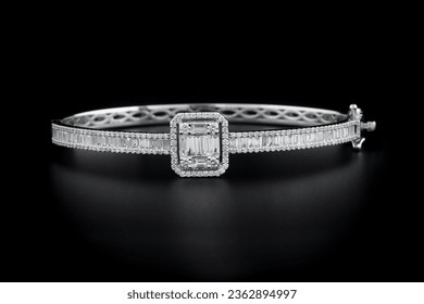 Multi stone baguette diamond bracelet on black background