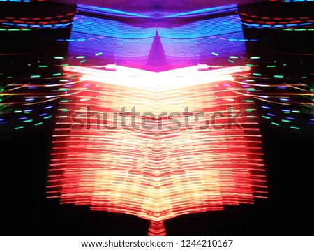 Multicolor Abstract lights in motion for Christmas and New Year celebrations. Happy Christmas. Welcome to 2019. Abstract background of Red, Yellow, Blue and white color. 