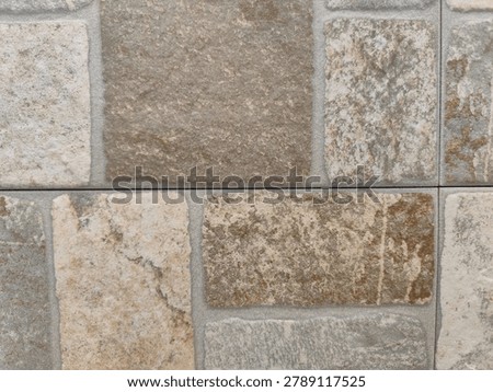 Multicolor cobblestone tile texture with ashlar grid pattern. High resolution stone effect ceramic surface with cement grout lines for 3D architectural rendering and BIM patio pavement mapping.
