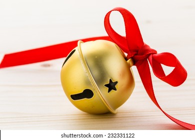 Multicolor Jingle Bells With Red Ribbon.