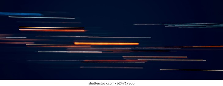 Multicolor Light trails on dark background