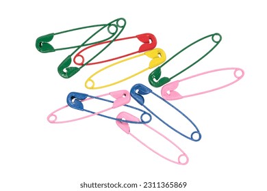 Multicolor safety pins isolated on white background. lots of colorful pins closeup