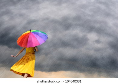 Multicolor Umbrella Yellow Woman Against The Rain