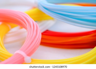 Multicolored ABS/PLN plastic background. Macro shot.