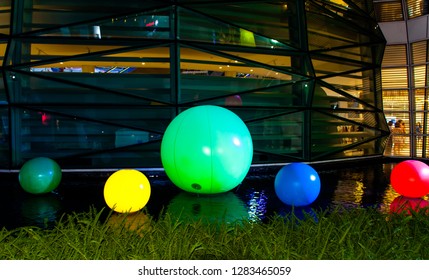 Multi-colored balls in the pool.