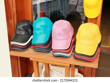 Multicolored Baseball Caps On The Shop Window