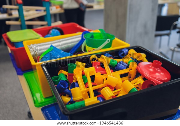Multi-colored blocks of a wooden\
constructor. Concept of development of preschool children.\
Close.