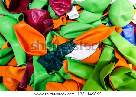 Multicolored blownout balloons as background