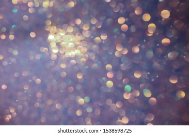 Multi-colored Bokeh. Colorful Beautiful Blurred Bokeh Background With Copy Space. Festive Texture. Glitter Multicolored Light Spots, Putting Up. Holiday Lights Bokeh Background. 