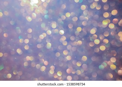 Multi-colored Bokeh. Colorful Beautiful Blurred Bokeh Background With Copy Space. Festive Texture. Glitter Multicolored Light Spots, Putting Up. Holiday Lights Bokeh Background. 