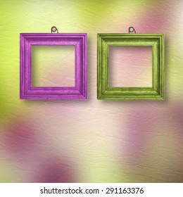 Multicolored bright frames hanging on the abstract pastel background