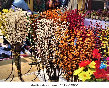 Multicolored  Bright And Shining Artificial Flower Sticks At Surajkund Craft Fair, Faridabad, Haryana, India