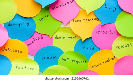 Multi-colored bubble stickers with terms from the IT field - release, bug, meeting, feature, database, agile