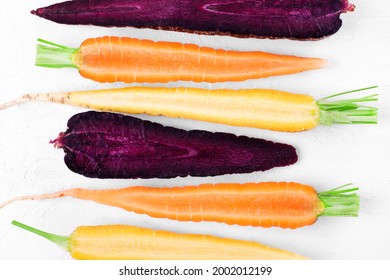 Multicolored carrots cut in halves. Cooking with farmers products - Powered by Shutterstock