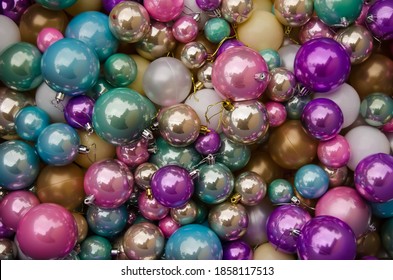 Multi-colored Christmas baubles as a background.multi-colored Christmas balls, yellow, pink, blue, green