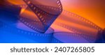 multicolored cinema background with film strip