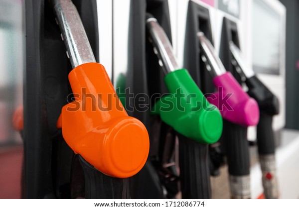 multi-colored
clean pistols at a gas station for
cars