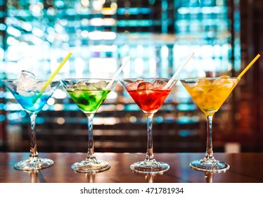 Multicolored cocktails at the bar. - Shutterstock ID 471781934