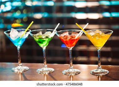 Multicolored cocktails at the bar. - Shutterstock ID 475486048