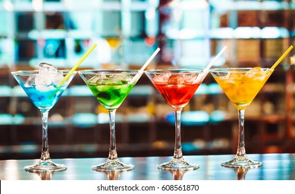 Multicolored cocktails at the bar. - Shutterstock ID 608561870