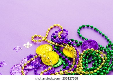 Multicolored Decorations For Mardi Gras Party On The Table.