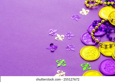 Multicolored Decorations For Mardi Gras Party On The Table.