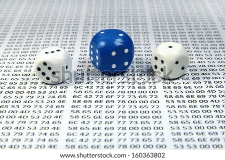 Multicolored dice against the hex codes closeup