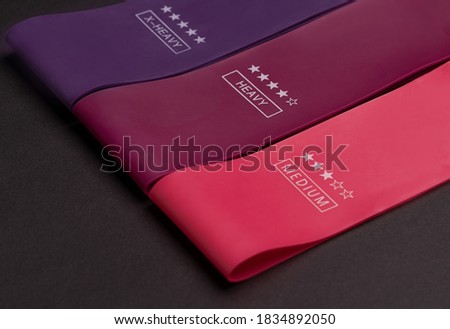Multicolored Exercise Rubber Band Fitness on black background