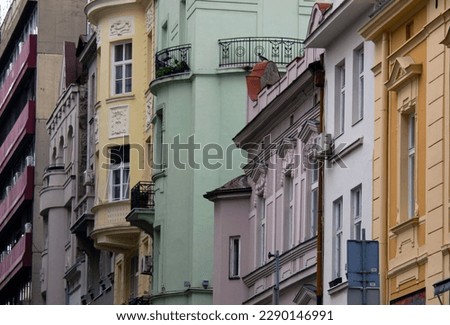 Multicolored facades of buildings in Belgrade, view from the street upwards.