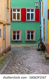 Multi-colored facades of houses on an old narrow street. Bamberg. Bavaria Germany.