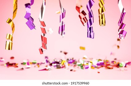 multicolored festive ribbons in the foreground. blurry confetti in the background. background for the holiday - Shutterstock ID 1917539960