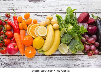 Multicolored fresh fruits and vegetables - Shutterstock ID 401702698