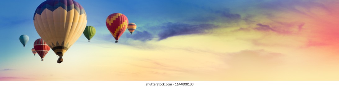 Multicolored Hot Air Balloons At Sunset Sky For Your Billboard Of A Travel Agency Or Wide Banner, Brigth Colors And Soft Sun Light.