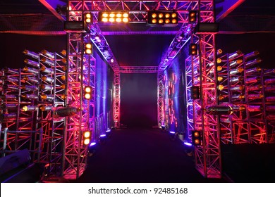 Multi-colored Illuminated Way With Grid To Boxing Ring Inside Fight Club; Many Lights