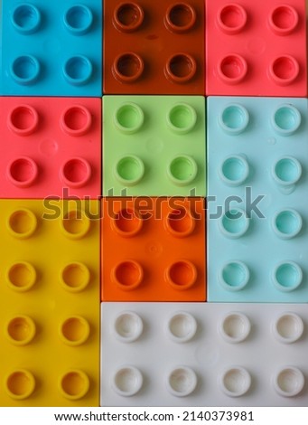 
multicolored lego cubes. multicolored background
