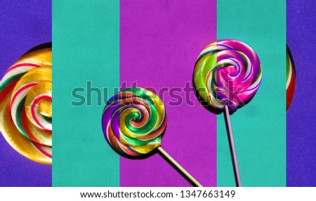 Multicolored lollipops on multicolored background. 