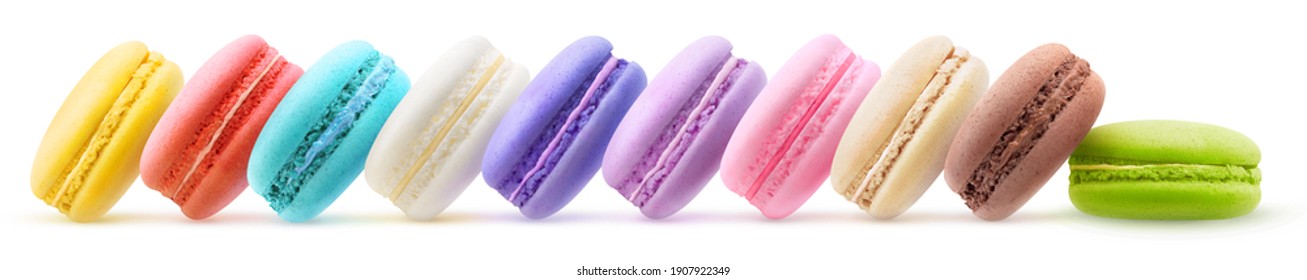 Multicolored macarons in a row isolated on white background