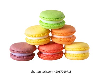 multicolored macaroons are stacked in a pyramid on the white background, isolated