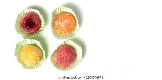 Multicolored Mochi In Package, Asian Dessert, Rice Cakes, Sweets Delivery, Traditional New Year Treat On White Background With Space For Text.