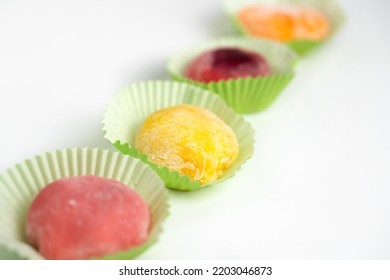 Multicolored Mochi In Package, Asian Dessert, Rice Cakes, Sweets Delivery, Traditional New Year Treat On White Background With Space For Text.