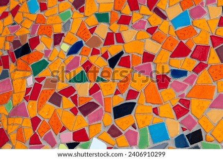 Multicolored mosaic tiles on a wall